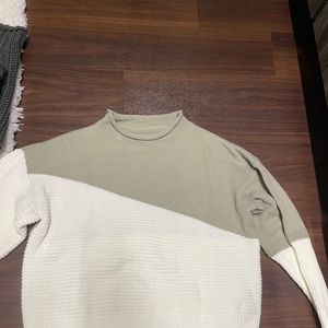 Nice green and white sweater.